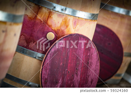 Wine mixing during fermentation process in barrel, Bordeaux Vineyard 59324160