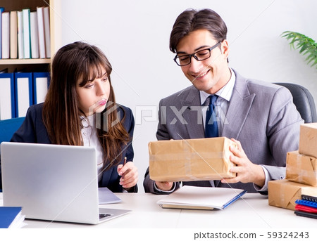 Business people receiving new mail and parcels Business people receiving new mail and parcels 59324243