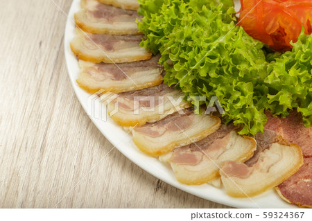 Sausage cuts of different varieties on a plate. Sausage cuts of different varieties on a plate. 59324367