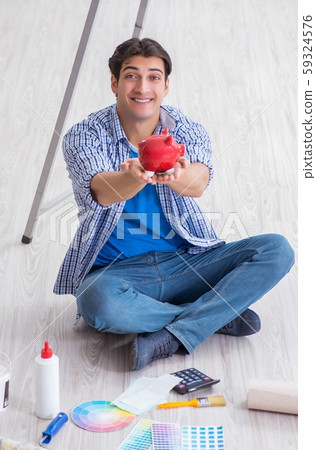 The young man overspending his budget in refurbishment project 59324576