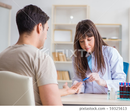 Patient during blood test sampling procedure taken for analysis Patient during blood test sampling procedure taken for analysis 59325613