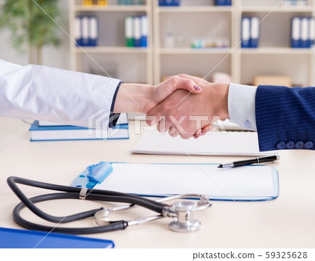 Man signing medical insurance contract Man signing medical insurance contract 59325628