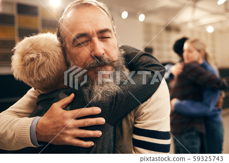 Mature couple embracing each other Mature couple embracing each other 59325743