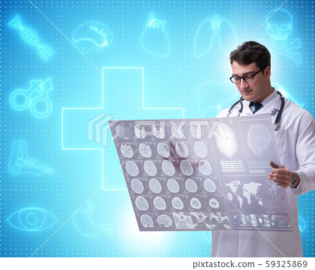 Telemedicine concept with doctor looking at x-ray image Telemedicine concept with doctor looking at x-ray image 59325869