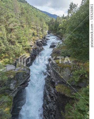 Waterfall Slettafossen at Verma with deep narrow 59328861