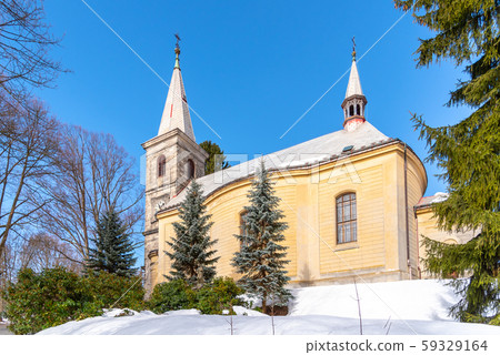 Church of Saint Peter and Paul in Tanvald on sunny winter day, Czech Republic Church of Saint Peter and Paul in Tanvald on sunny winter day, Czech Republic 59329164