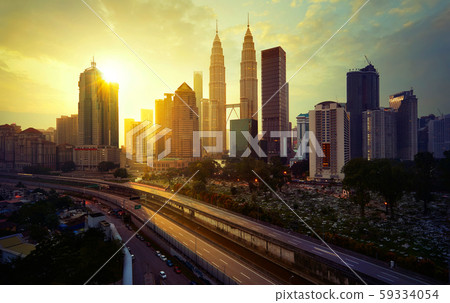 Sunrise in Kuala Lumpur with the silhouette of the Kuala Lumpur city Sunrise in Kuala Lumpur with the silhouette of the Kuala Lumpur city 59334054