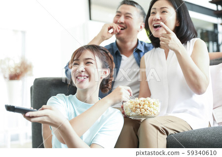 Family lifestyle watching TV 59340610