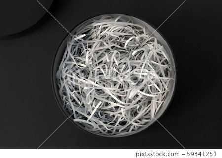 Opened gift box with decorative straw, filler, 59341251