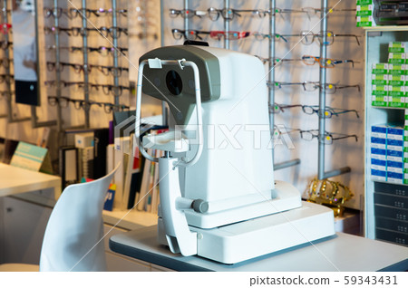 Auto refractometer in optical store 59343431