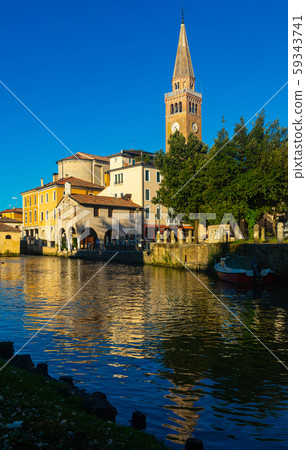 Old historical buildings and Lemene river in Portogruaro, Venezia Old historical buildings and Lemene river in Portogruaro, Venezia 59343741