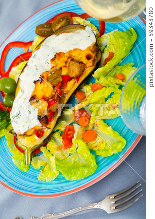 Stuffed eggplant with vegetables and cheese 59343780