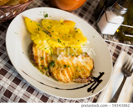 Codfish fillet with green sauce Codfish fillet with green sauce 59343862