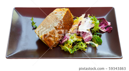 Leek pie with sauce and greens 59343863