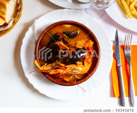 Peruvian seafood soup Parihuela 59343878