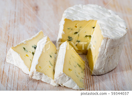 Blue creamy cheese on wooden background Blue creamy cheese on wooden background 59344037