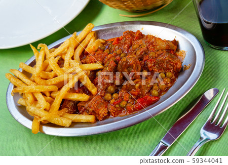 Asturian stewed beef with fries Asturian stewed beef with fries 59344041