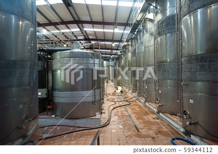 contemporary winery with stell barrels 59344112