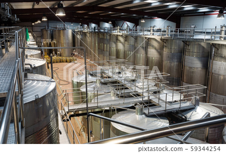 contemporary winery factory with barrels 59344254