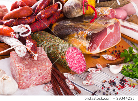 Variety of meats on table Variety of meats on table 59344255