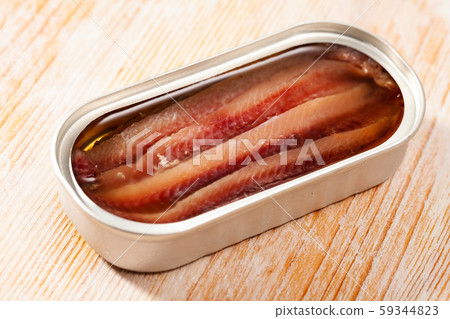 Opened tin can of anchovy fillet Opened tin can of anchovy fillet 59344823