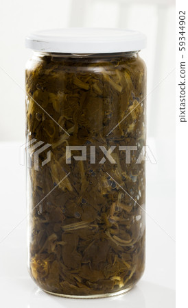 Spinach in glass jar Spinach in glass jar 59344902