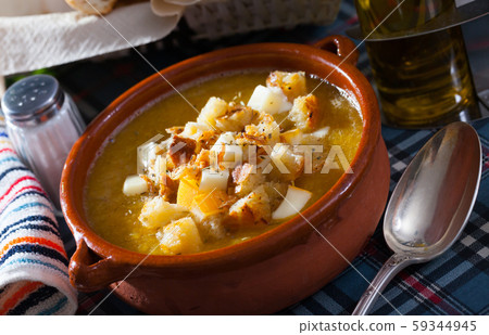 Cream soup with croutons and cheese Cream soup with croutons and cheese 59344945
