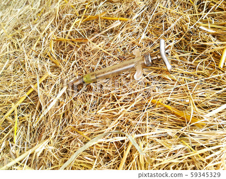 injection needle on hay bale injection needle on hay bale 59345329
