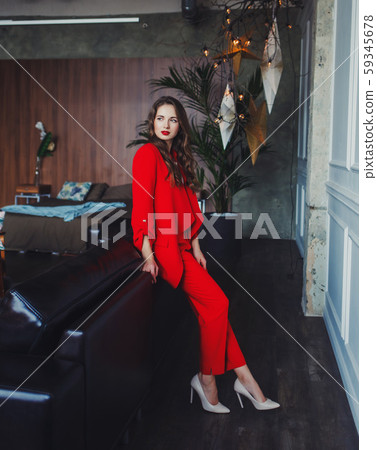 business woman in red suit 59345678