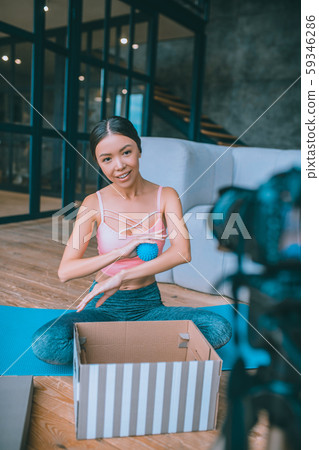 Fitness blogger recommending good massage ball for followers 59346286