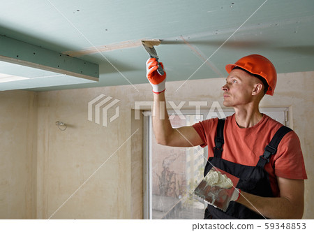 Filling the seams plasterboards. 59348853