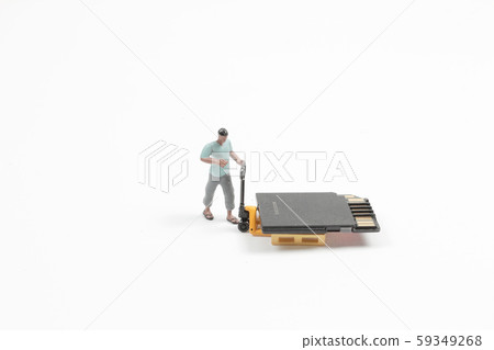 A Mini Worker Working On Sd Card. 59349268