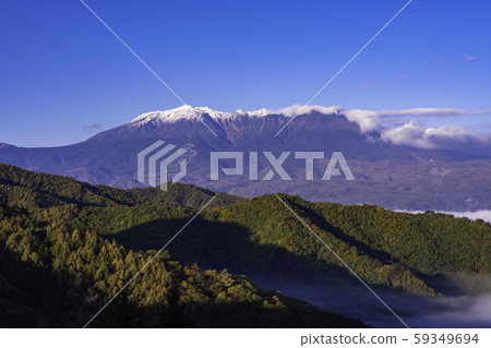 (Nagano) Mt. Mitake of Kiso seen from the old Hida Kaido / Jizo Pass (Nagano) Mt. Mitake of Kiso seen from the old Hida Kaido / Jizo Pass 59349694