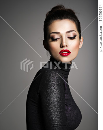 Beautiful young fashion woman with red lipstick. 59350434