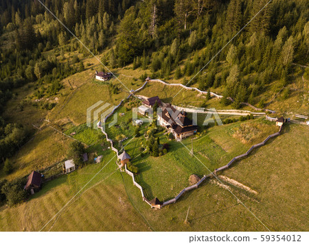 Aerial view monastery in Carpathian village 59354012