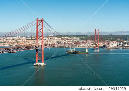 April 25 bridge with a view of Lisbon, in the summer. Portugal. 59354059