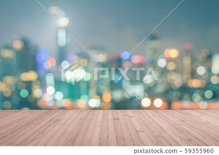 Wood floor terrace or wooden table with blur background rooftop perspective view city night light bokeh background of cityscape 59355960
