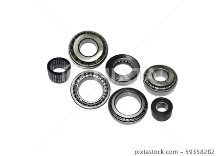 Different types of automotive bearings isolated on white background Different types of automotive bearings isolated on white background 59358282