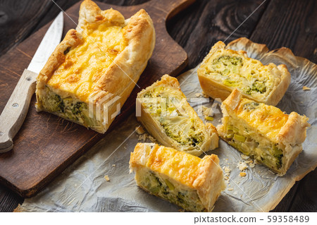 Broccoli, cheese and leek tart, vegetarian cuisine. Broccoli, cheese and leek tart, vegetarian cuisine. 59358489
