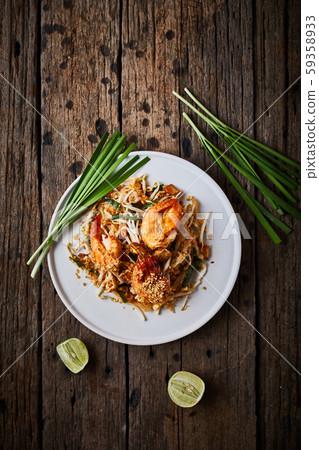 Padthai noodles with shrimps and vegetables. Padthai noodles with shrimps and vegetables. 59358933