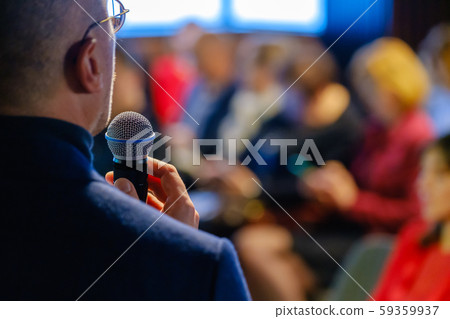 Male presenter speaks to audiences 59359937