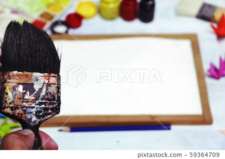 hand man holding paintbrush on tool art background. the tool for artist with copy space full color. Hobbies,free time,Lifestyle,they are for art and Drawing. hand man holding paintbrush on tool art background. the tool for artist with copy space full color. Hobbies,free time,Lifestyle,they are for art and Drawing. 59364709
