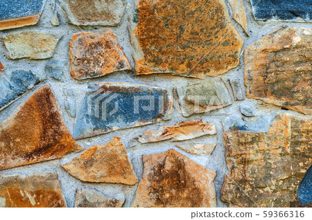 background from a wall erected from roughly treated brown background from a wall erected from roughly treated brown 59366316