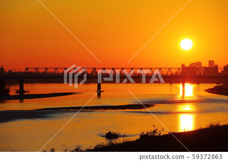 Sunrise and Keio Line Tamagawa Bridge viewed from Tamagawahara Bridge Sunrise and Keio Line Tamagawa Bridge viewed from Tamagawahara Bridge 59372863