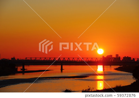 Sunrise and Keio Line Tamagawa Bridge viewed from Tamagawahara Bridge Sunrise and Keio Line Tamagawa Bridge viewed from Tamagawahara Bridge 59372876
