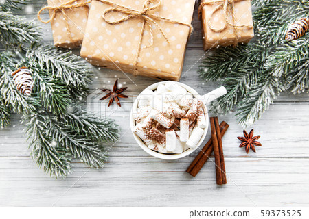 Christmas composition with hot chocolate and gift Christmas composition with hot chocolate and gift 59373525
