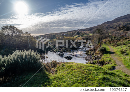 The River Glen and waterfalls by Carrick in County Donegal - Ireland The River Glen and waterfalls by Carrick in County Donegal - Ireland 59374827