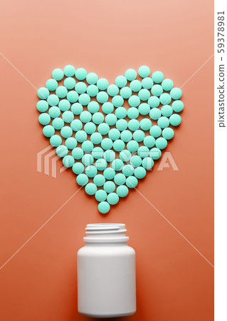 Vitamins B 12 on a red heart-shaped substrate, 59378981