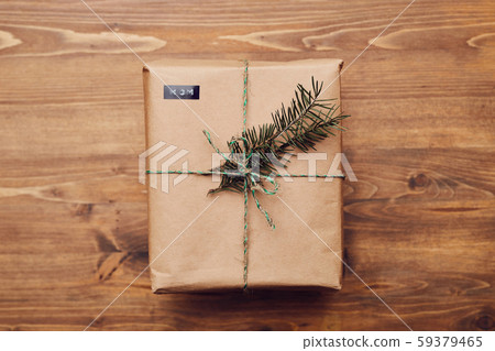 Gift box decorated fir branch 59379465