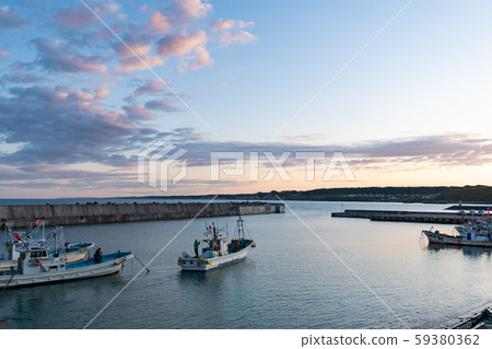 Fishing boats leaving the sunrise fishing port / Fishing port in Hokkaido Image of fresh seafood Fishing boats leaving the sunrise fishing port / Fishing port in Hokkaido Image of fresh seafood 59380362